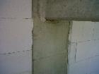 Eliminazione del ponte termico con un totale rivestimento a cappotto :muro e cornicione